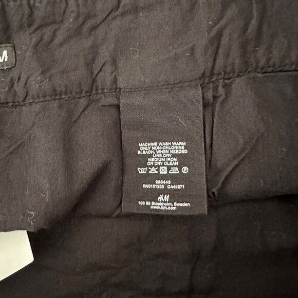 H&M A Line Mini Skirt Eyelet Insert Cotton Minimalist Black Sz 14 NWT - Picture 7 of 7